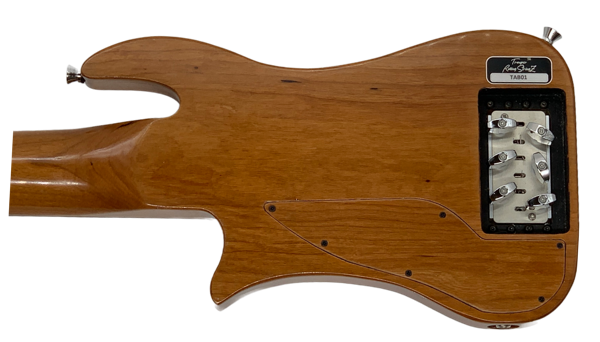 Back of Cherry Trouper Travel Guitar with Gold Peachtree Bridge